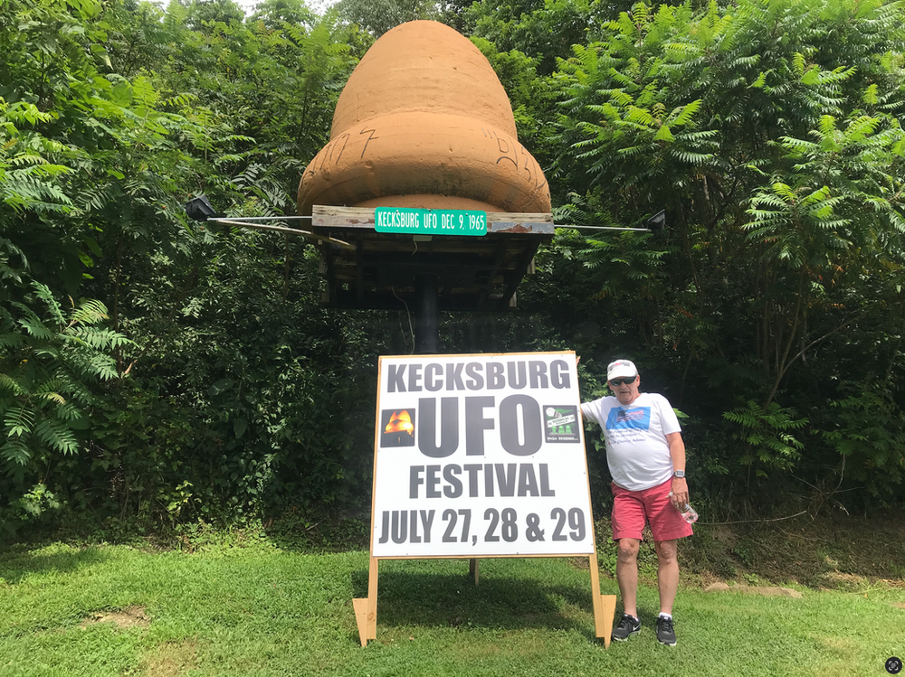 Bob Gatty poses with the Kecksburg UFO replica during the UFO Festival in 2017 The Kecksburg UFO replica